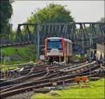 . A train of the Hamburger Hochbahn is arriving in Barmbek on September 17th, 2013.