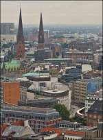 . View from the Michel on the city of Hamburg and a train of the Hamburger Hochbahn on September 21th, 2013.