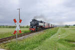 The steam locomotive  Molli  99 2322-8. on its way to the stop  Steilküste  between Kühlungsborn and Heiligendamm in the german province of Mecklenburg-Vorpommern. Date: 7th June 2025.