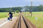 The section of the narrow-gauge railway Mecklenburgische Bäderbahn seen from the Steilküste halt in a westerly direction.