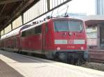 111 128 is standing in Dortmund main station on August 21st 2013.