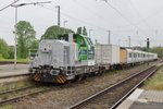 Vossloh G 650 305 hauls a British EMU through Viersen on a grey 10 May 2016.