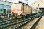 Scanned picture of DB 180 001 with Hungarian EC-stock at Dresden, 6 November 1999. 