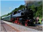 The steam locomotive 86 333 with its heritage wagons is waiting for passengers in Weizen on August 19th, 2006.