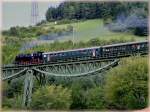 The steam engine 86 333 is hauling the heritage train over the Biesenbach viaduct near Epfenhofen on August 19th, 2006. 