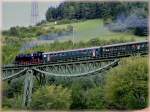 The steam engine 86 333 is hauling the heritage train over the Biesenbach viaduct near Epfenhofen on August 19th, 2006.