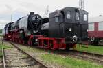 Fireless steam loco 6601 hauls pacific 01 066 through the area of the Bayerisches Eisenbahnmuseum in Nördlingen on 26 May 2022.
