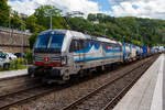 The Siemens Vectron MS - 193 110 'Zugersee' (91 80 6193 110-4 D-Rpool) of Railpool GmbH (Munich), leased to SBB Cargo International AG, is passing through Kirchen/Sieg station towards Siegen on June 9, 2026, with a combined transport train operated b ...