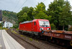 The 187 198-7 (91 80 6187 198-7 D-DB) of DB Cargo AG is running on July 16, 2026, with an empty open coil wagons (type Sahmms 711), through Kirchen (Sieg) towards Cologne.

Once again, a kind greeting back to the friendly locomotive driver.

The  ...