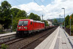 The 187 198-7 (91 80 6187 198-7 D-DB) of DB Cargo AG is running on July 16, 2026, with an empty open coil wagons (type Sahmms 711), through Kirchen (Sieg) towards Cologne.

Once again, a kind greeting back to the friendly locomotive driver.

The  ...