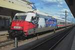 Back Home? DB 101 070 in ice hockey team 'Mannheim Adler' livery calls at Mannheim Hbf on 3 July 2013.