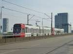 A tram (line 9) is driving on the Severinsbridge in Cologne on August 21st 2013.