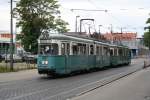 Line 24 with Streetcar GT6+GT6 243+230 on 13.07.2009 in front of Heidelberg main station.