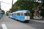 Line 24 with Streetcar GT6+GT6 233+234 on 13.07.2009 in front of Heidelberg main station.