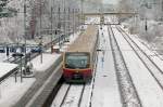 Bergfelde station overview with a Class 481 / 482 urban train leaving the station in service as S45 towards Birkenwerder station. Bergfelde, 2015-01-31