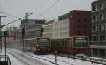 Two DB 481 S-Bahn units are crossing on 10.1.2010 at Berlin-Alexanderplatz.