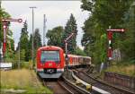 . A Hamburger S-Bahn train on the S 1 is leaving the station Blankenese on September 21th, 2013.