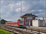 . A train of the Hamburger S-Bahn is entering into the station Barmbek on September 17th, 2013.