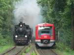 Old and new: prussian steam locomotive T11  7512 Hannover  with the Prussian Train and a class 474 train in Hoheneichen, 2007-09-02