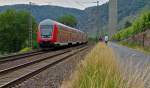 . A local train to Koblenz is running through Winningen on June 20th, 2014.
