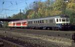 141 440-8 with city-colours and a control car BDnrzf 740 at Ulm, October 17th, 1988.