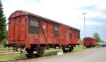 Gmss goods wagon on narrow gauge wagon, at Ochsenhausen, Mai 21st, 2009.
