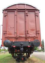 Gmss goods wagon on narrow gauge wagon, at Ochsenhausen, Mai 21st, 2009.