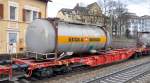 Container wagon type Sgns 696 with container, at Ulm February 26th, 2010.