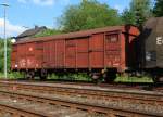 Covered freight wagon with two axes (Gbs), of the DB AG (Germany)  on 17.05.2011 in Herdorf (Germany).