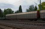 Covered, large-scale sliding door wagon with four sets of wheels, without partition system, Habbiins 344, of the DB Railion. On 11.08.2011 in a train, just before Unkel, Germany.