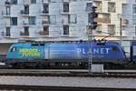 Electric locomotive 470 005 departs Vienna Central Station with its train.