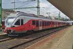 MAV 415 052 stands in BUdapest-Delí on 13 May 2018. These EMUs were delivered in this red, white and grey colours as Class 5341, but all have changed to the new yellow, blue and white of the MAV.