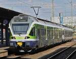 Electric train set 415 061 leaves Budapest Keleti station with another train set. May 8, 2026
