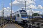 Electric multiple unit 815 005 photographed leaving Budapest Keleti station.