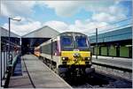 The CIE IR CC 201 is waiting to depart with its train in Dublin Connolly Station (Baile Átha Cliaht Stáisún Ui Chonghaile).