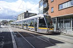 Tram LUAS Citadis 3009 in Bernburb Street of Dublin. The system operates on a 750 V DC overhead power supply. The international standard rail gauge of 1,435 mm (4 ft 8 1⁄2 in) is used, rather than the Irish 1,600 mm. Date: 11 May 2018.