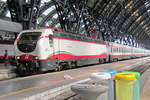 FSE 402 160 shows her new colours at Milano Centrale on 1 July 2013.