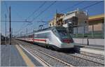 An FS Trenitalia IC equipped with two power cars or E 414 electric locomotives on the journey to Lecce while passing through Polignano a Mare.

April 22, 2023