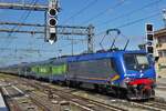 Locomotive E464.342 pushes its train out of the station Verona Porta Nuova to the siding. May 9th, 2025
