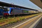 Locomotive E 464.662 pushes its train out of the station Verona Porta Nuova. May 4th, 2025.

