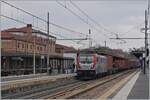 The FS Mercitalia Rail E 494-010 runs with a Carge train throug Reggio Emilia.