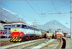 The FS E 656 274 wiht an EC to Milano in Domodossola and in the background an ohter E 656 and a D 345.