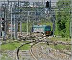 The Trenord 711 027 from Varese to Treviglio is arriving at in Gallarate Station.