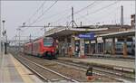 The FS Trenitalia BUM BTR 831 004 on the way from Aosta to Torino by his stop in Chivasso.