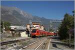 The bi-modular FS Trenitalia BUM BTR 813 001 from Torino to Aosta leaves Chatillon Saint Vincent station.