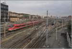 The FS Trenitalia ETR 400  Frecciarossa 1000  9600 from Roma is arriving at Torino PN.