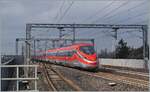 The FS Trenitalia ETR 400 010 is the  Frecciarossa 1000  FR 9624 on the way from Roma Termini to Milano Centrale and runs wiht a very hight speed trough the Reggio Emilias AV Station. 

14.03.2023