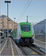 The Trenord ETR 421 030 from Milano is arrived at the Domodossola Station.