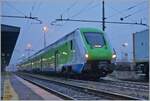 On the last light of the day is waiting the Trenord ETR 421 028  Rock  in Domodossola his departure to Milano. 

24.02.2023