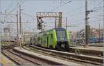 The FS Treniatla ETR 521 173  ROCK  in the new regional train livery departs as RE to Torino Porta Nuova from the train departure station Milano Centrale.  
On the left in the image, far in the background, two SBB ETR 610 / RABe 503  Pinocchio  can be seen waiting to be put into service as EC 64 to Basel (via Domo).  

September 30, 2026